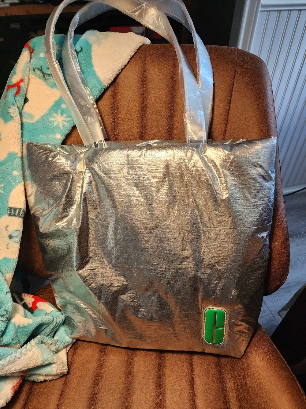 limited-edition Clinique tote bag With a metallic silver finish